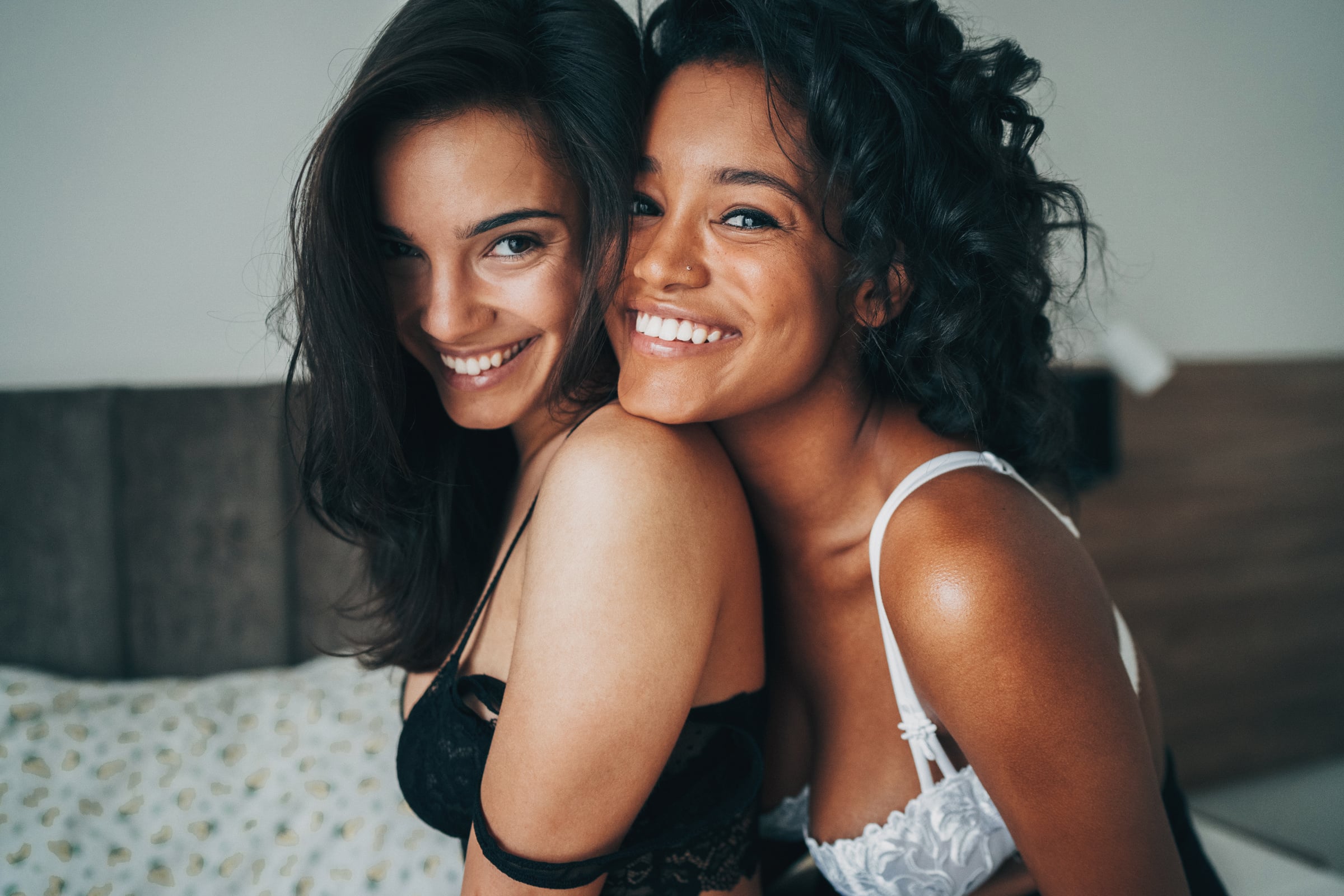 Lesbian Couple in Lingerie Embracing Each Other